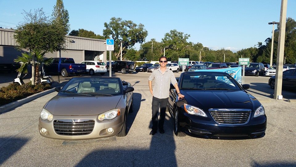 Chrysler 200 (car on right) and my old Sebring (left)